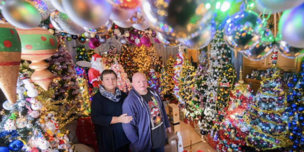 Husband and wife decorate 555 Christmas trees!  Here's who the world record couple is