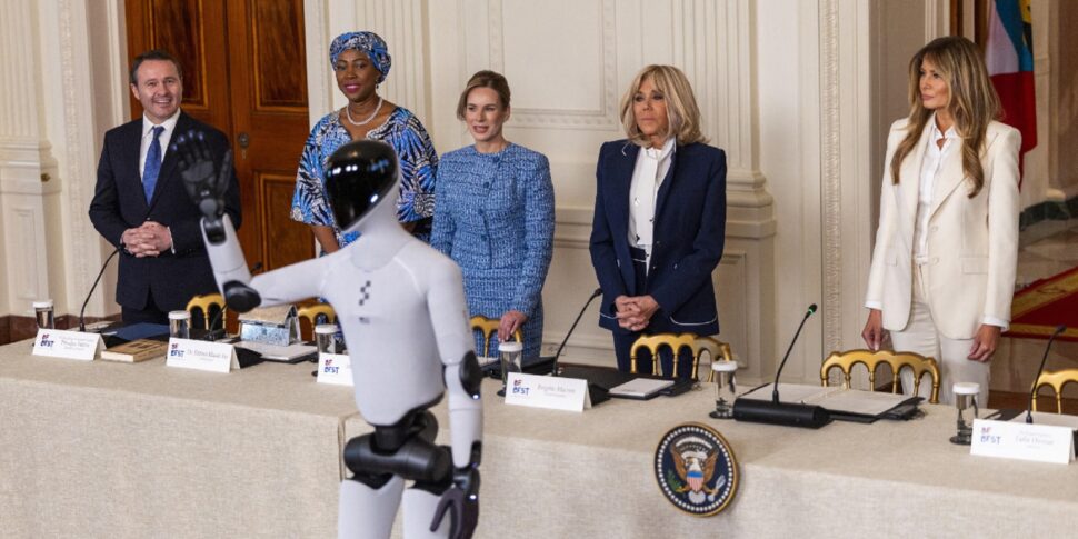 A robot escorts Melania to the White House, first time in history. The first lady proposes humanoids as educators for American students