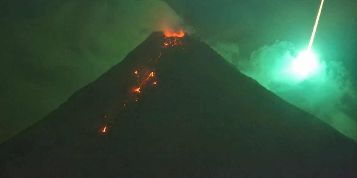 Spectacular images of the meteor exploding above an erupting volcano in the Philippines
