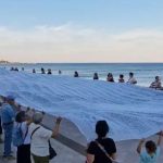 In Catanzaro a shroud with over 18 thousand names of children who died in Palestine