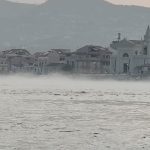 The sea she-wolf at Torre Faro, a minute of fog on the Strait surprises the swimmers of Capo Peloro