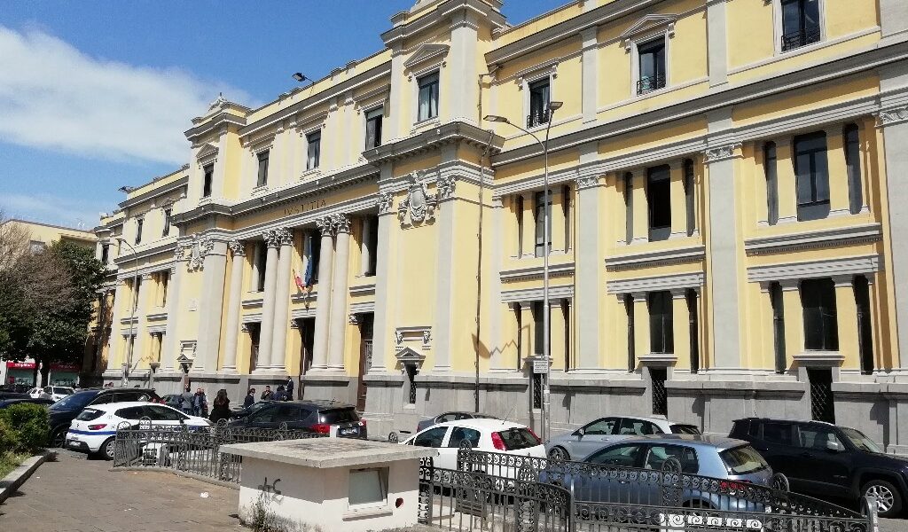 Extortion of a building contractor, sentences reduced on appeal for the two Strongoli defendants