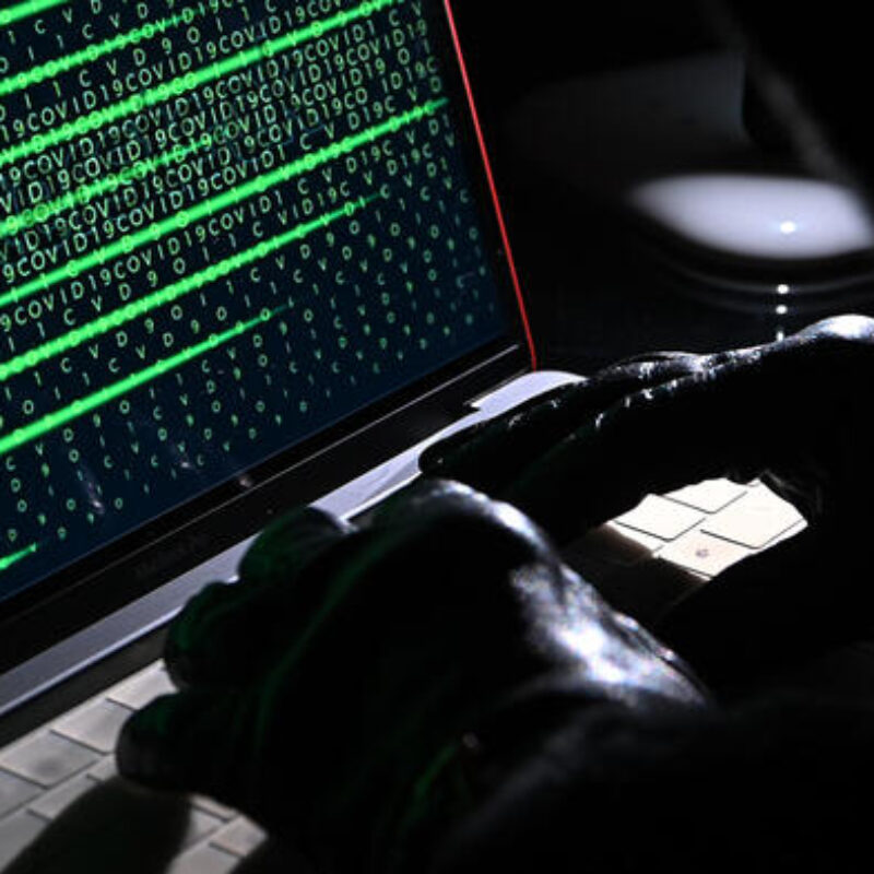 An image that simulates and represents the figure of a hacker engaged in a cyber attack. The United States and its closest allies have formally accused China of being behind an unprecedented wave of cyber attacks that hit Microsoft and several companies around the world.ANSA/ ALESSANDRO DI MARCO